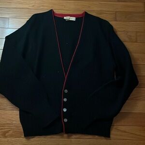 Cute navy blue sweater with red trim